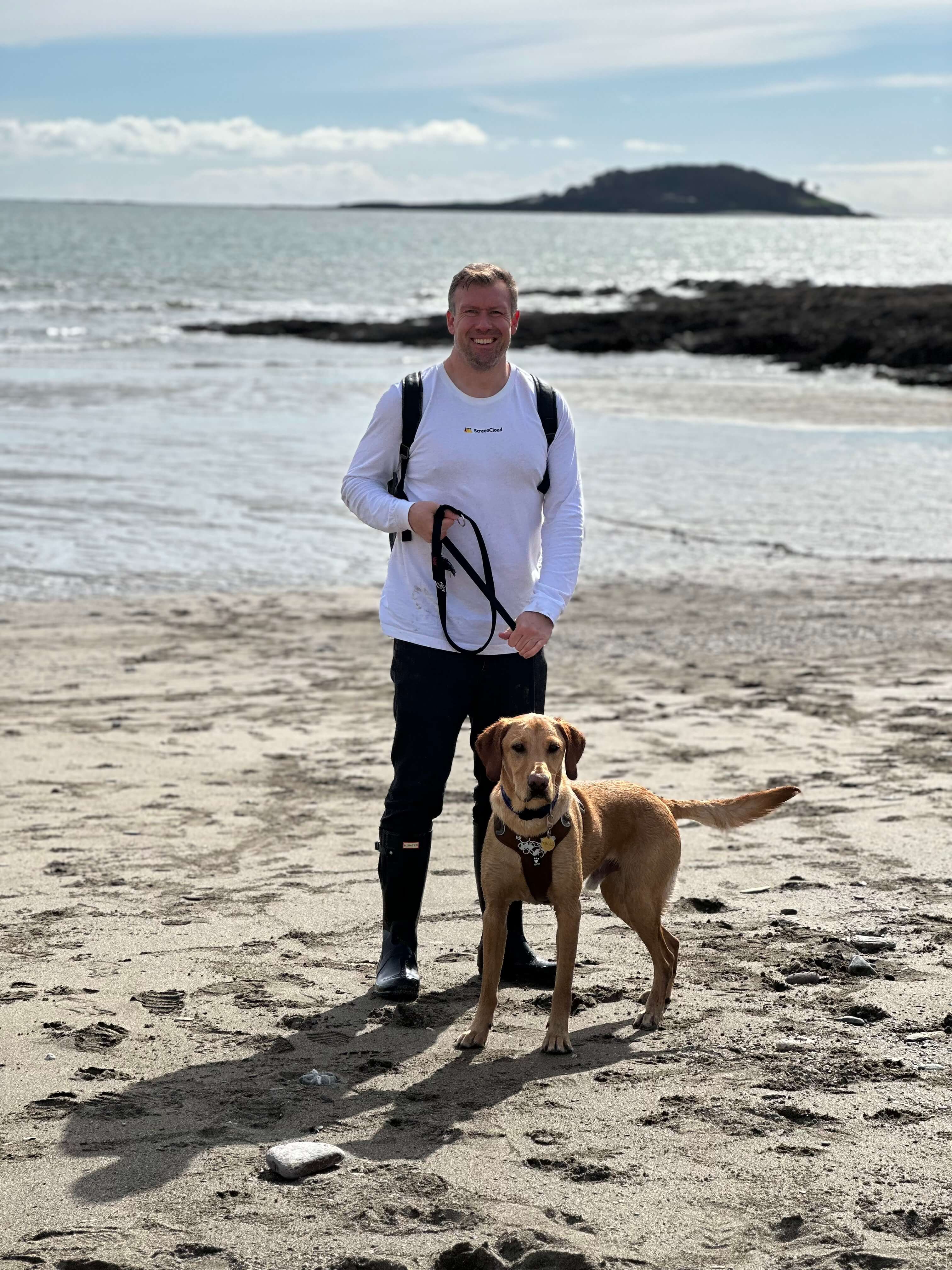 Heartwarming moment on the beautiful Cornish coast, enjoying quality time against dramatic cliffs and seaside scenery