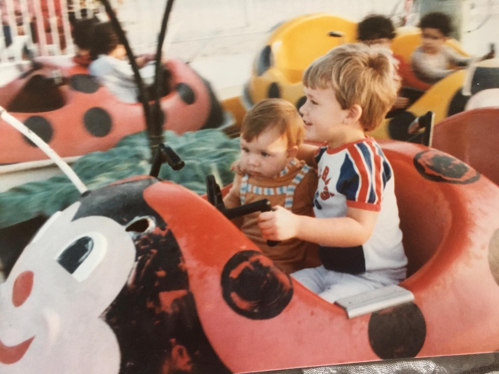 My sister and I in Dubai as kids at the fairground